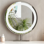 Round makeup mirror with LED lighting on a stand against a neutral wall.