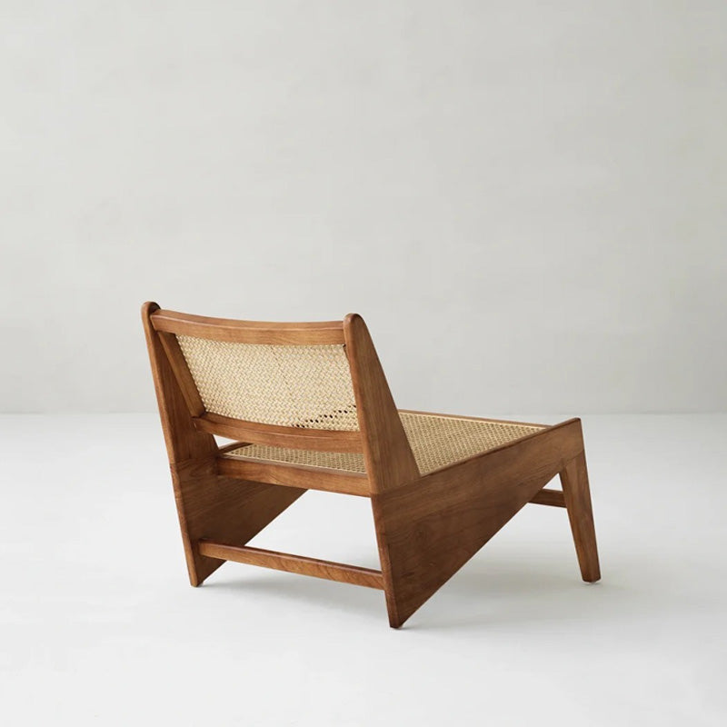 Wooden chair with wicker backrest on a white background