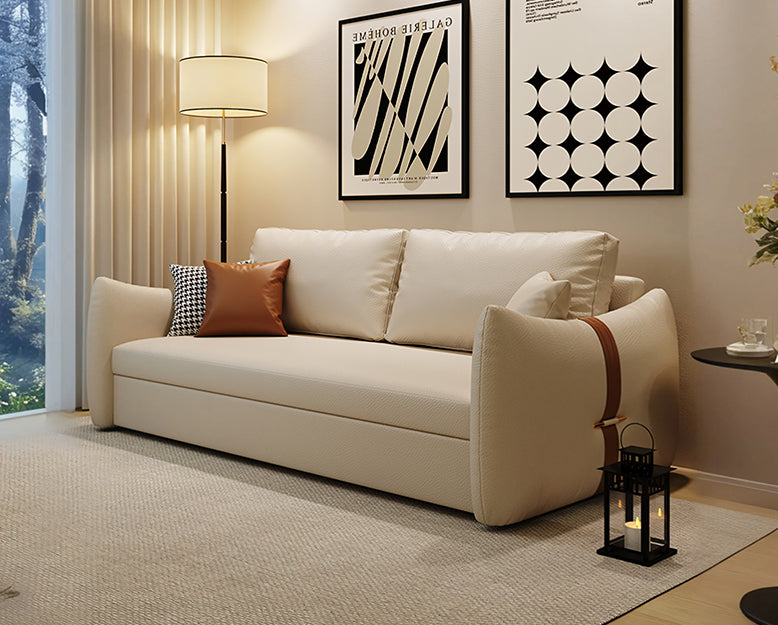 Beige sofa with decorative pillows in a living room setting