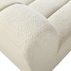 Close-up of textured beige fabric with a soft, plush surface.
