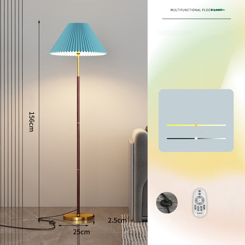 Floor lamp with pleated blue shade and remote control, dimensions displayed.