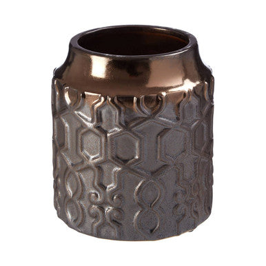 Decorative ceramic vase with textured design on a white background