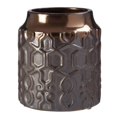 Decorative vase with textured design and bronze top on a white background