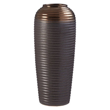 Decorative vase with ribbed texture on a white background
