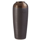 Decorative vase with ribbed texture on a white background