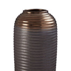 Bronze-colored vase with ribbed texture on a white background