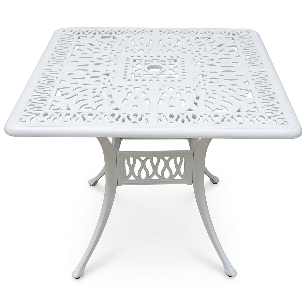 White metal outdoor table with intricate design on a white background