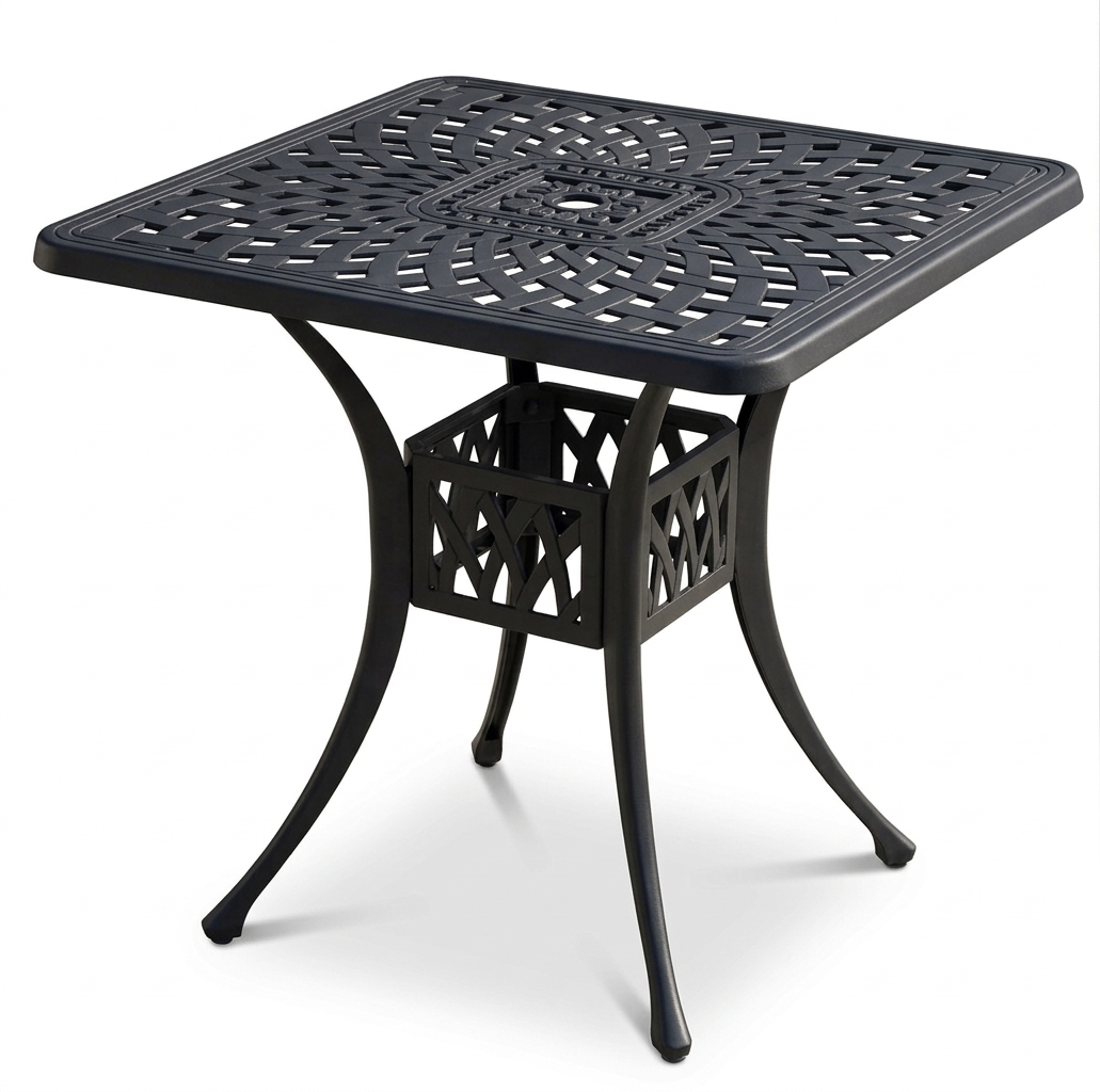 Black metal outdoor table with intricate design on a white background