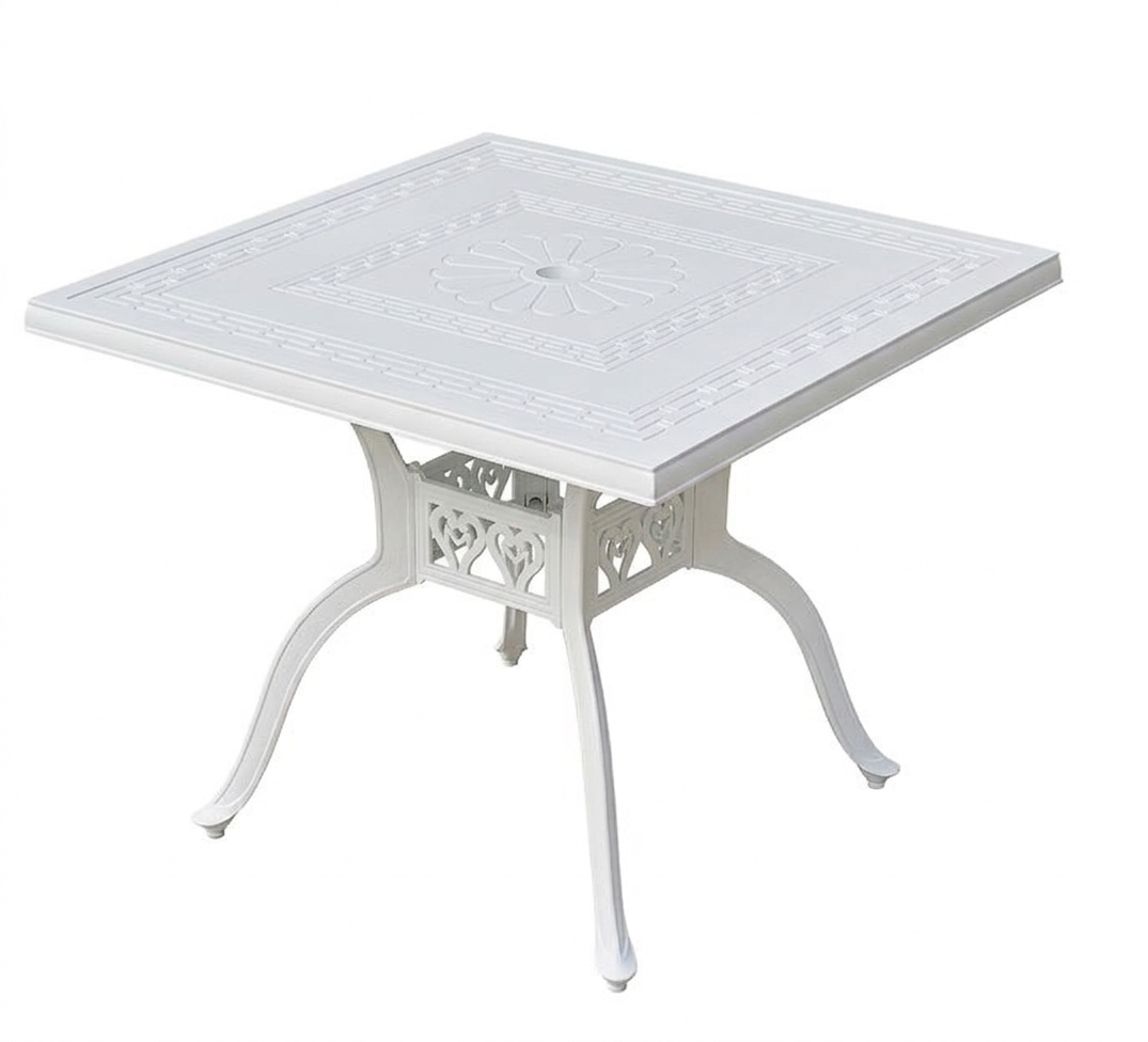 White square table with decorative legs on a white background