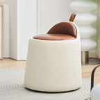 White and brown ottoman in a room with a rug and chair.