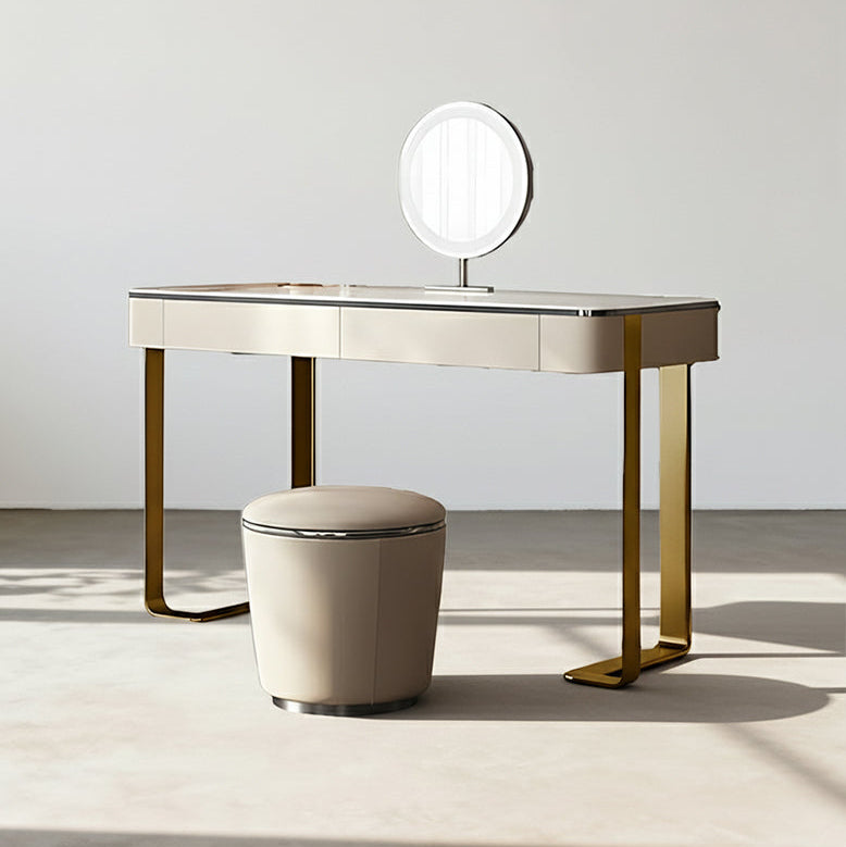 Dressing table with a round mirror and stool in a minimalistic setting