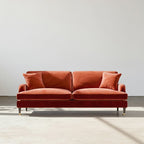 Red sofa on a white background
