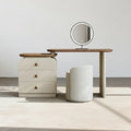 Dressing table with mirror and stool in a minimalistic setting