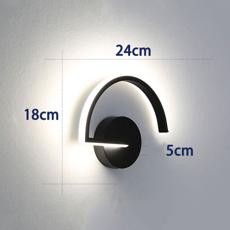 Wall-mounted light fixture with dimensions labeled on a gray background
