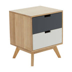 Wooden nightstand with three drawers in natural wood, black, and white on a white background