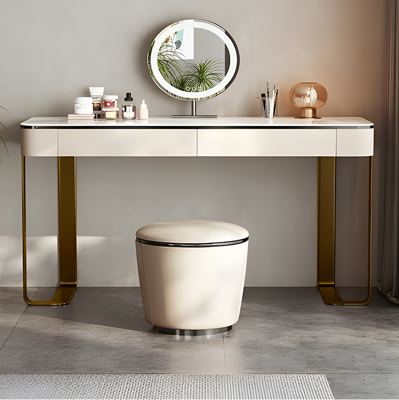 Dressing table with mirror, stool, and cosmetic items against a neutral wall.