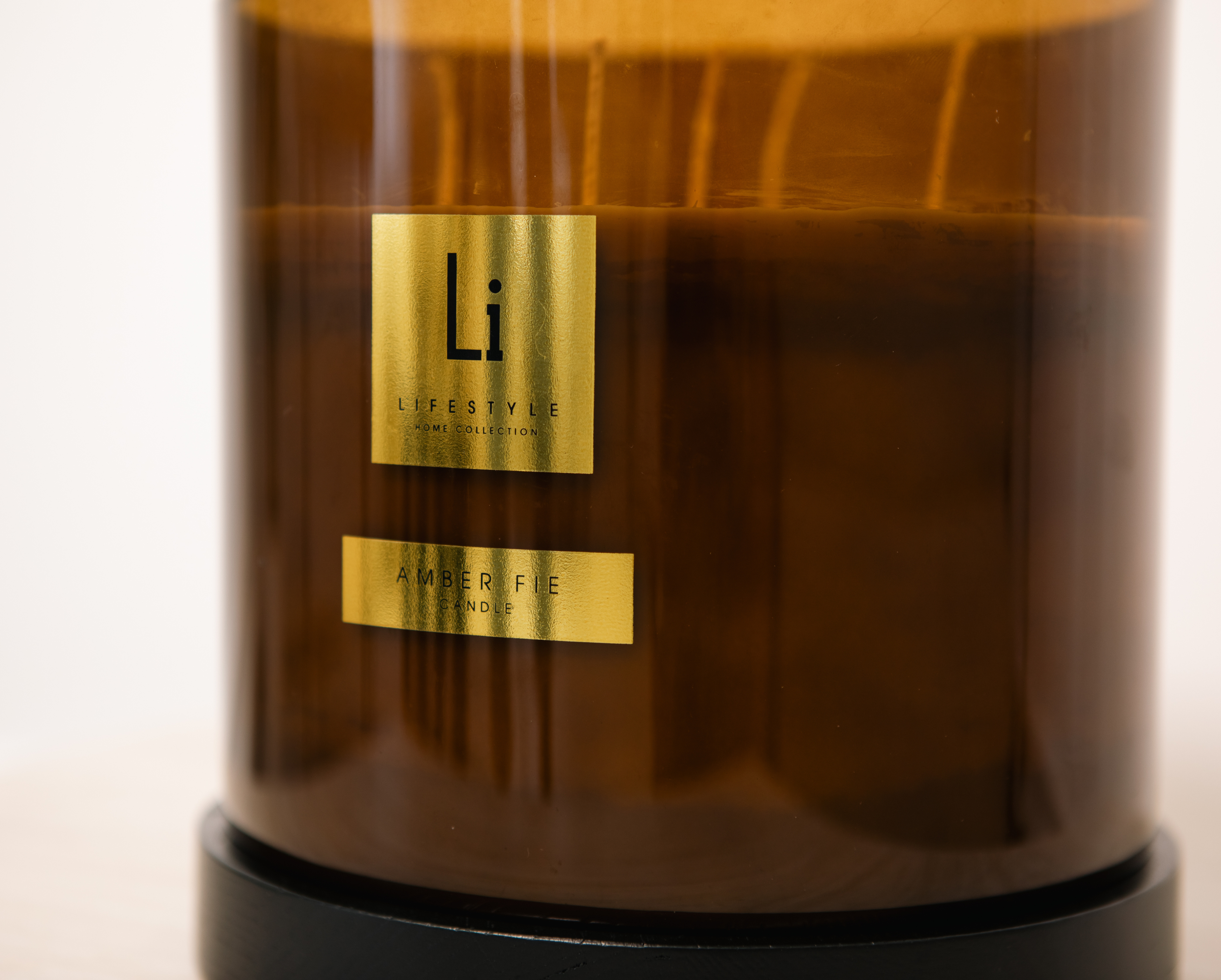 Brown cylindrical container with gold label featuring 'Li Lifestyle' on a light background