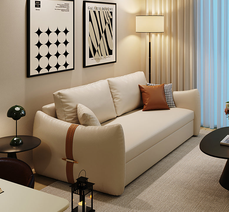 Beige sofa with decorative pillows in a living room setting