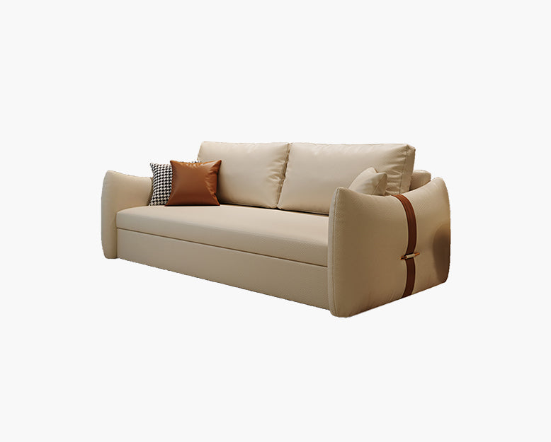 Beige sofa with decorative pillows on a white background