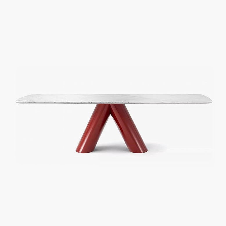 A modern console table featuring a long, thin white marble top and a sculptural, glossy red V-shaped metal base, shown against a plain white background.