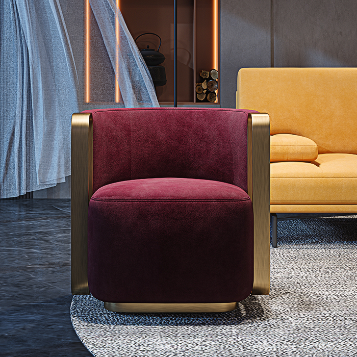 Maroon armchair with gold frame in a modern interior setting