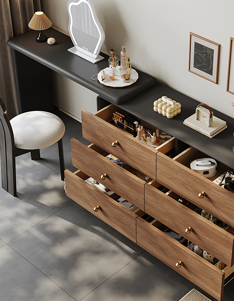 Wooden dresser with open drawers in a room setting