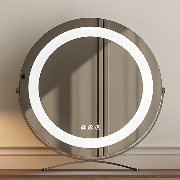 Round makeup mirror with LED lighting on a stand against a neutral background
