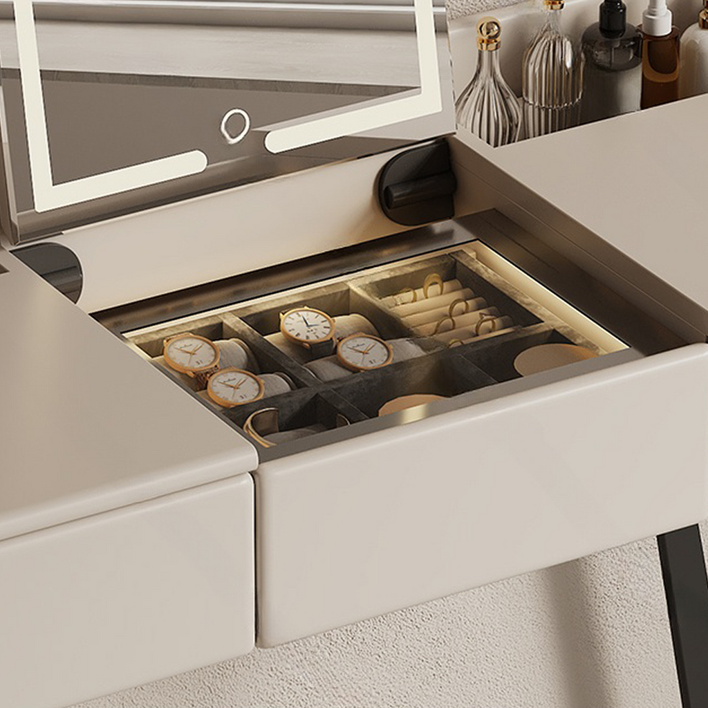 Makeup vanity with open drawer displaying various items