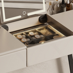 Makeup vanity with open drawer displaying various items