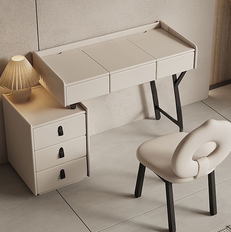 Beige desk with drawers and a chair in a minimalistic room.