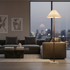 Modern living room with a sofa, coffee table, and floor lamp.