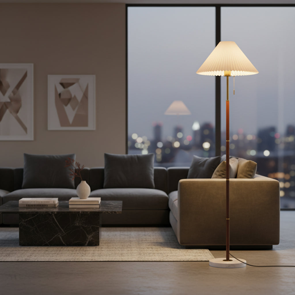 Modern living room with a sofa, coffee table, and floor lamp.