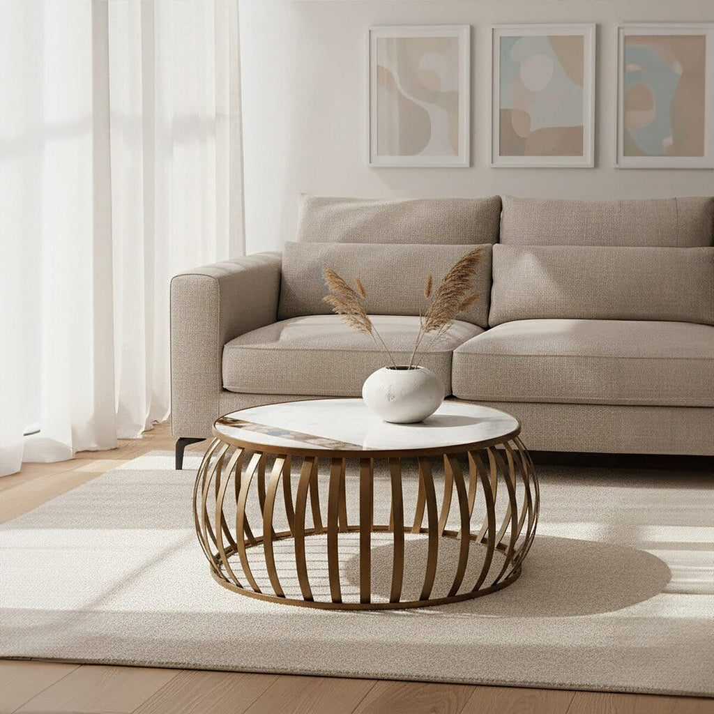 Modern living room with a beige sofa, wooden coffee table, and abstract art on the wall.