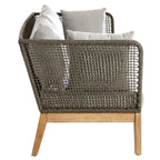Woven chair with wooden legs and cushions on a white background