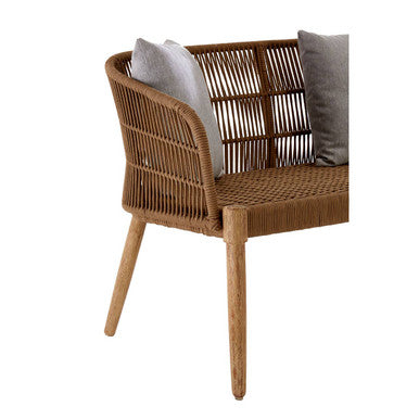 Wicker chair with gray cushions on a white background