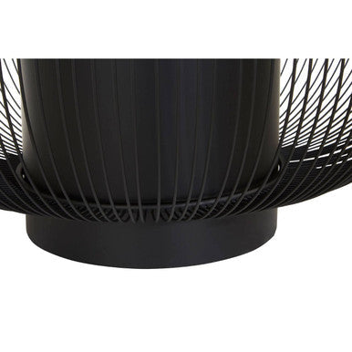 Close-up of a black metal basket on a white background