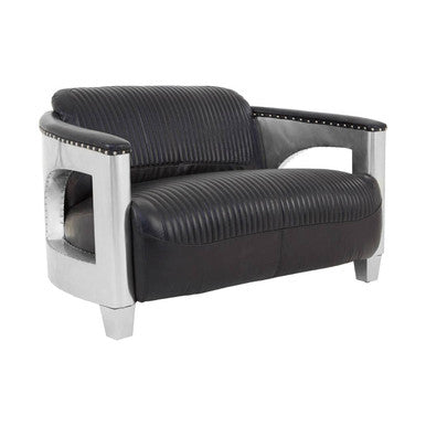 Black leather armchair with chrome frame on a white background