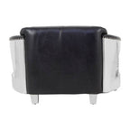 Black leather armchair with silver accents on a white background