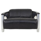 Black leather sofa with chrome armrests on a white background