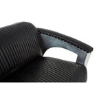 Black office chair with ribbed design on a white background
