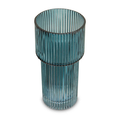 Teal glass vase with ribbed design on a white background