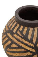 Ceramic vase with geometric pattern on a white background