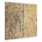 Two wooden panels with a textured, circular pattern on a white background