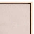 Close-up of a beige textured fabric panel with a wooden frame.