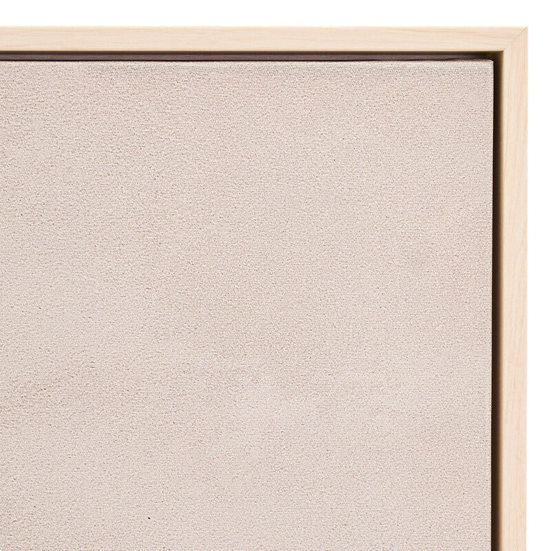 Close-up of a beige textured fabric panel with a wooden frame.