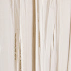 Close-up of beige fabric with a subtle pattern