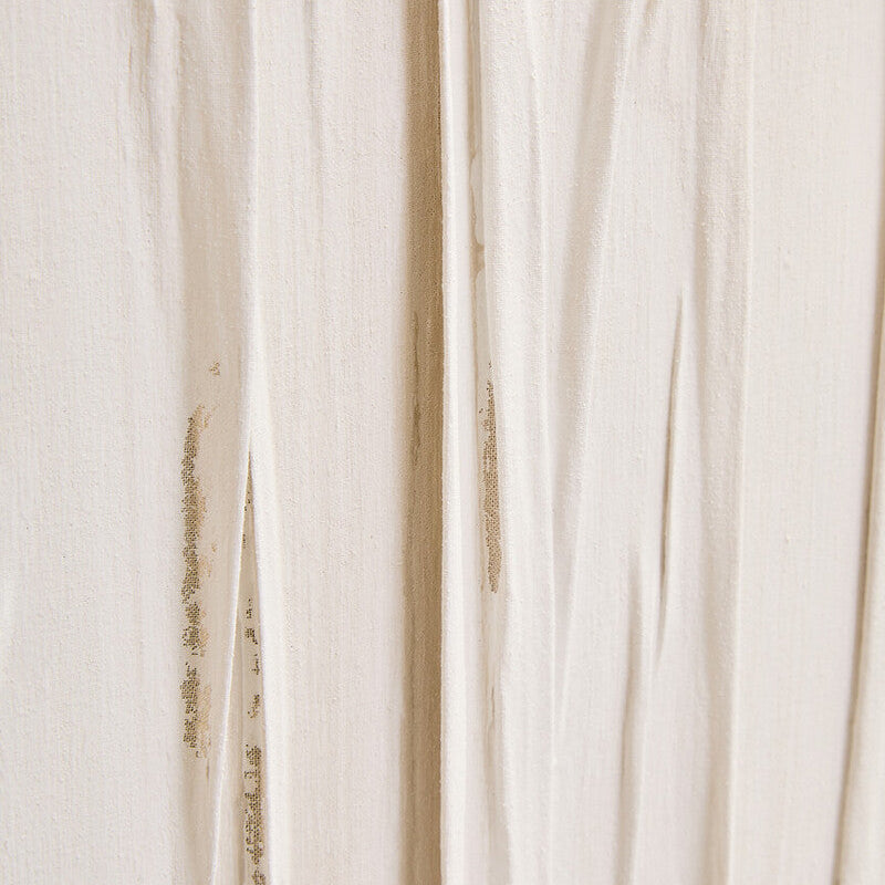 Close-up of beige fabric with a subtle pattern