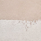 Textured surface with two different color tones, one beige and one white.