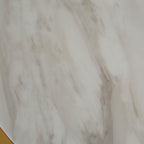 Close-up of a marble-like surface with beige and brown patterns