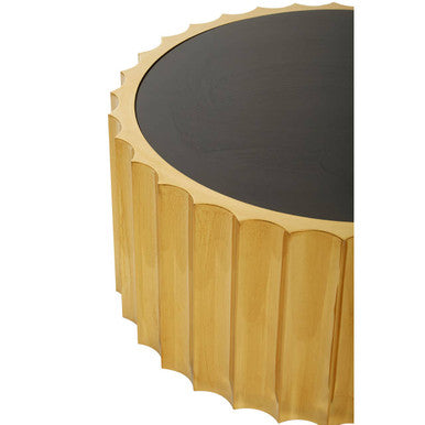 Round table with black top and gold base on a white background